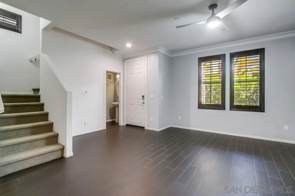 1859 Khaki Lane Chula Vista, CA 91913 - Photo 10 of 62 wooden floor in an empty room with a window
