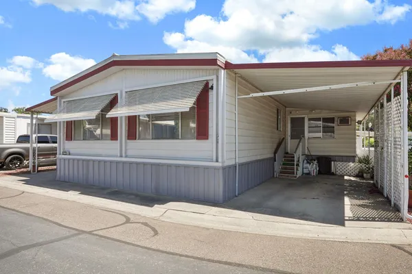 a view of a house with a patio