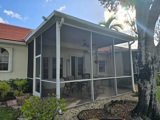 a backyard of a house with lots of green space
