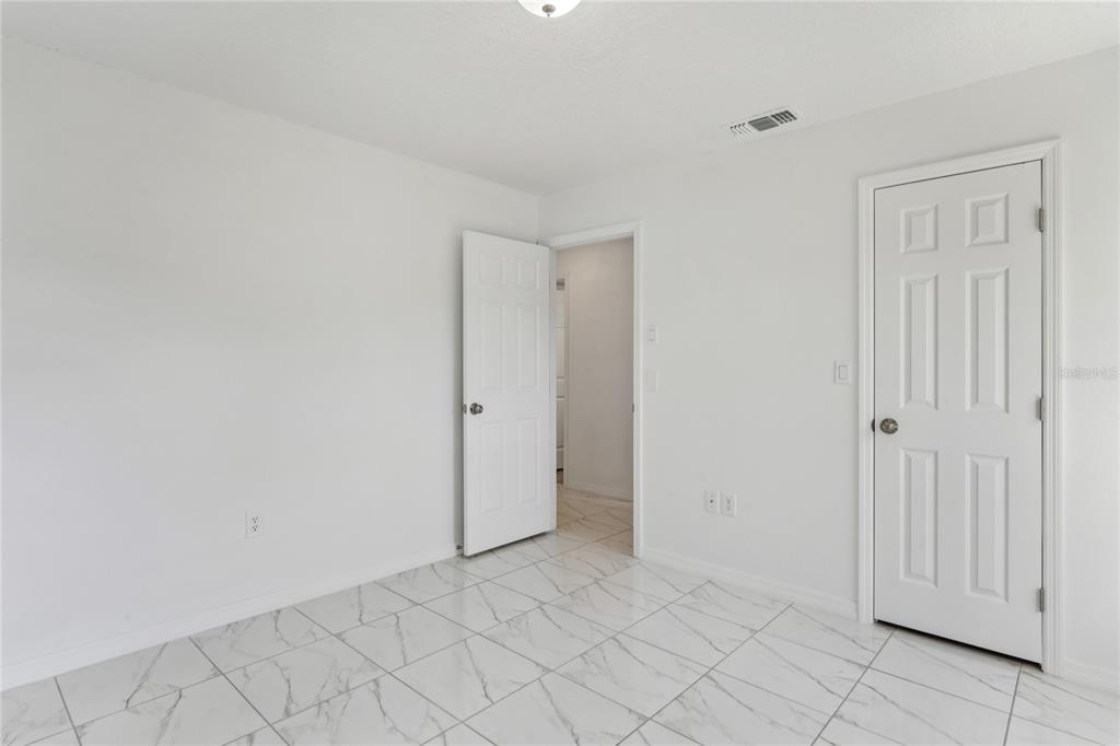 10237 Carrin Road Spring Hill, FL 34608 - Photo 21 of 39 a view of an empty room