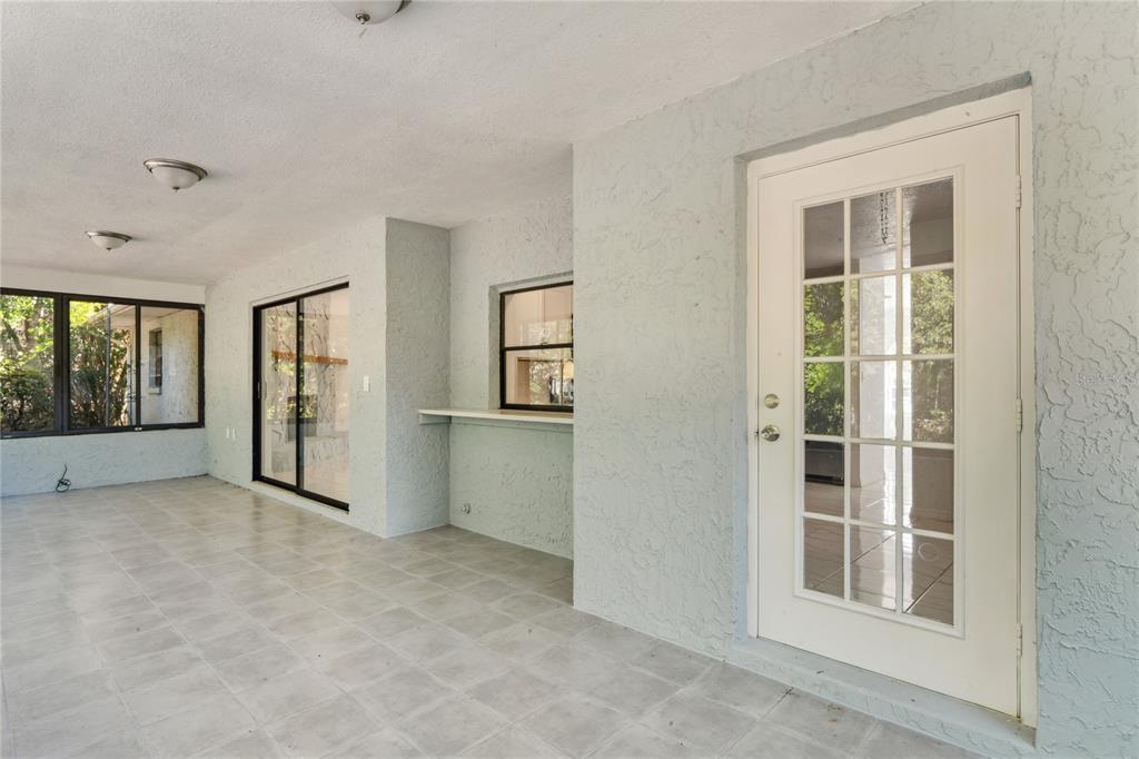10237 Carrin Road Spring Hill, FL 34608 - Photo 28 of 39 an empty room with windows