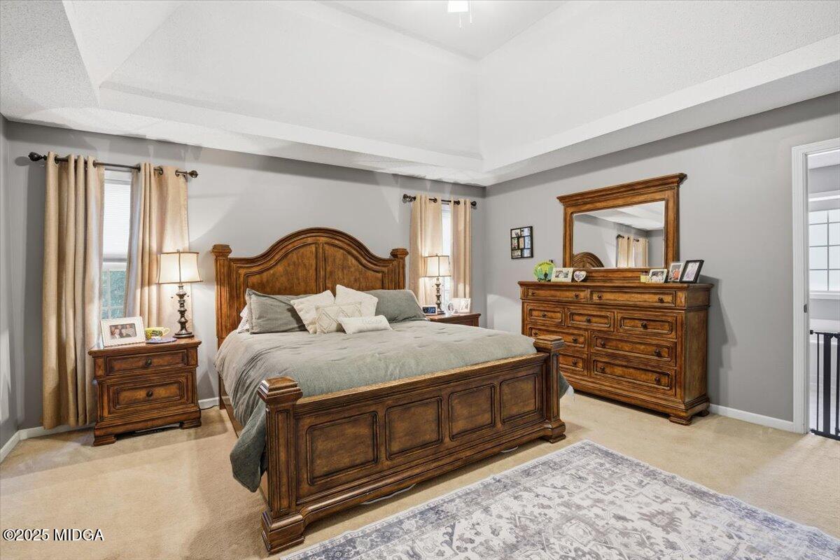 664 Aarons Circle Gray, GA 31032 - Photo 19 of 46 a bedroom with a bed and a dresser