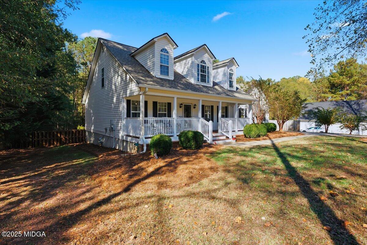 664 Aarons Circle Gray, GA 31032 - Photo 36 of 46 a front view of a house with a yard