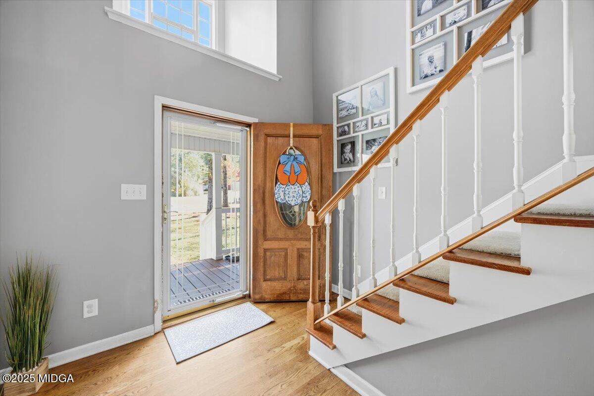 664 Aarons Circle Gray, GA 31032 - Photo 5 of 46 a view of an entryway with wooden floor and door