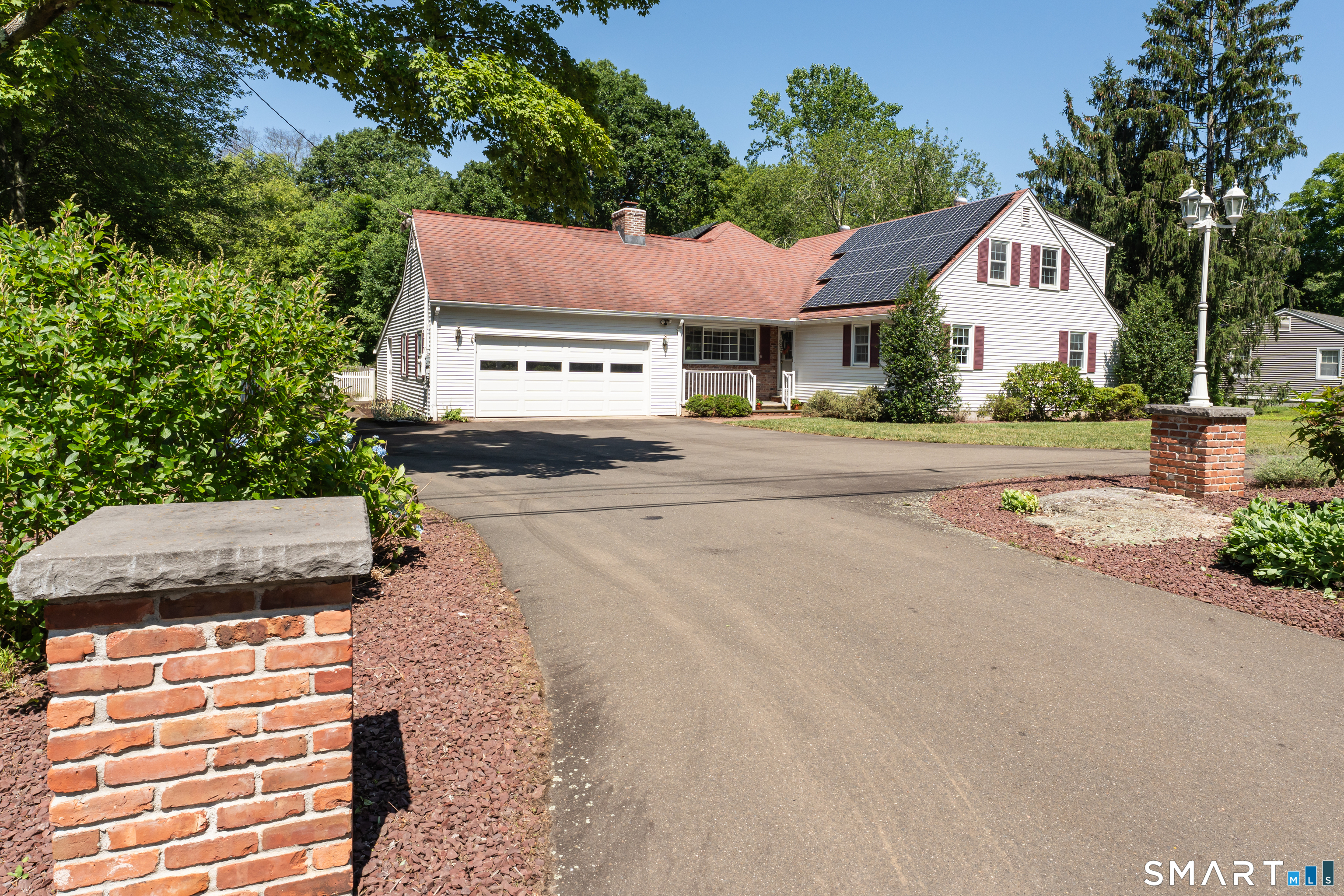 110 Nut Plains Road Guilford, CT 06437 - Photo 1 of 40 A gracious circular drive welcomes you home.