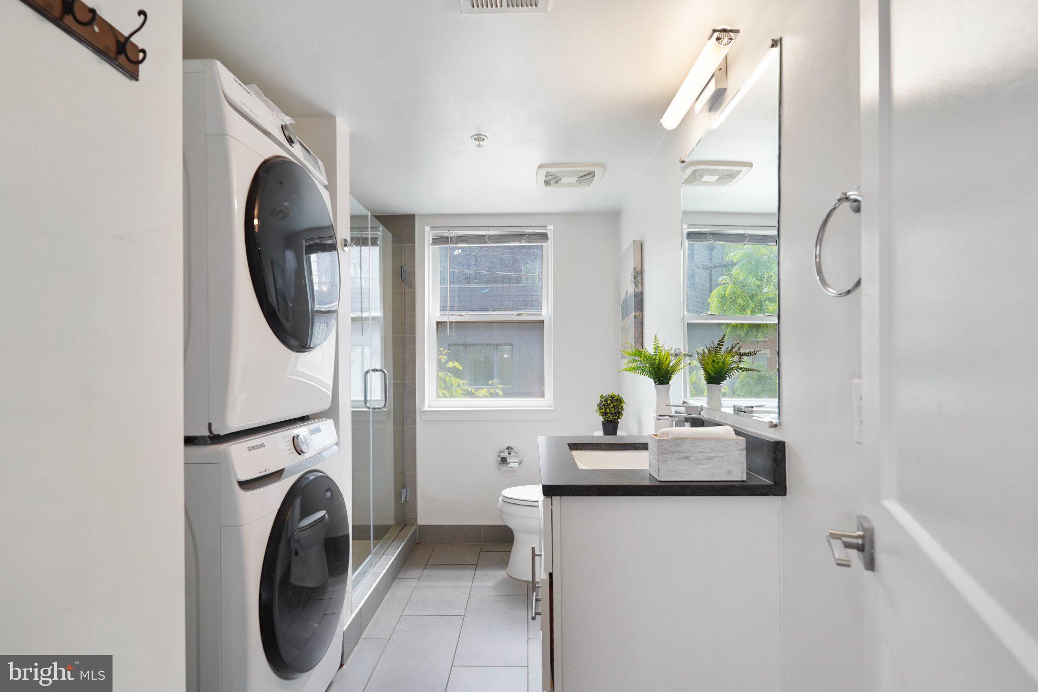 7723 Alaska Avenue Northwest, Unit 103 Washington, DC 20012 - Photo 4 of 12 Modern laundry and bath oasis.