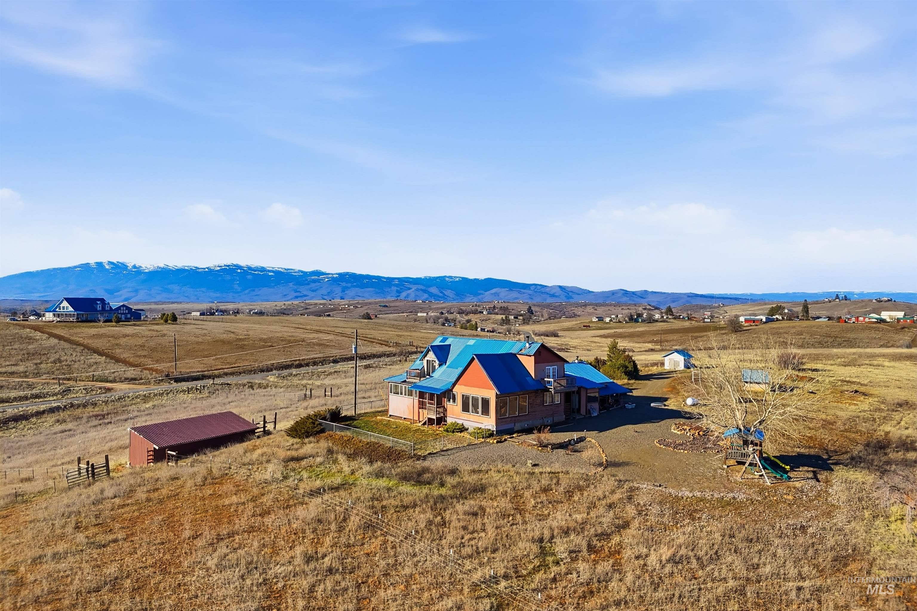 1252 Mesa Mesa, ID 83643 - Photo 1 of 50 View of rural area with a mountain backdrop
