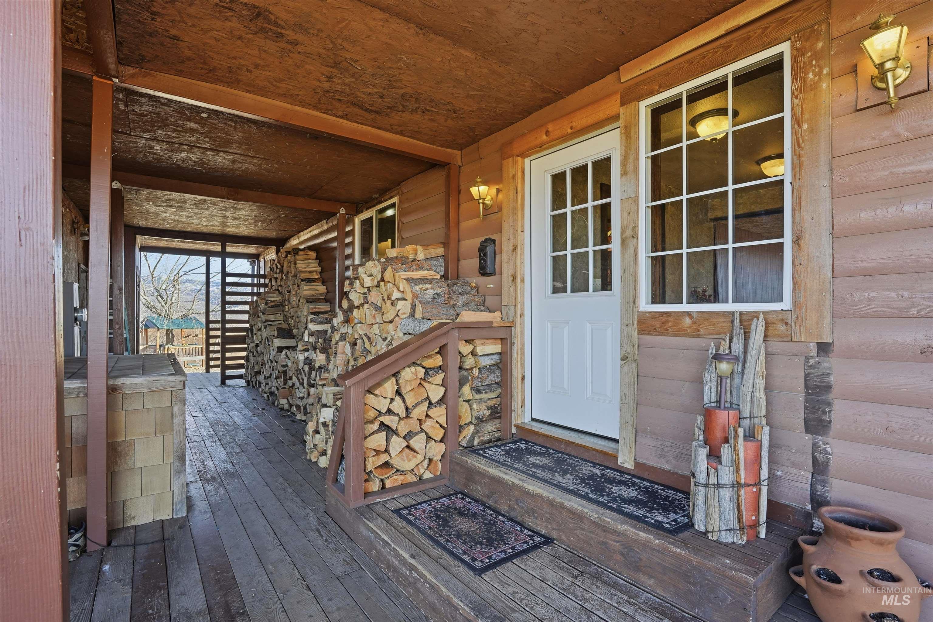 1252 Mesa Mesa, ID 83643 - Photo 2 of 50 View of exterior entry featuring log veneer siding