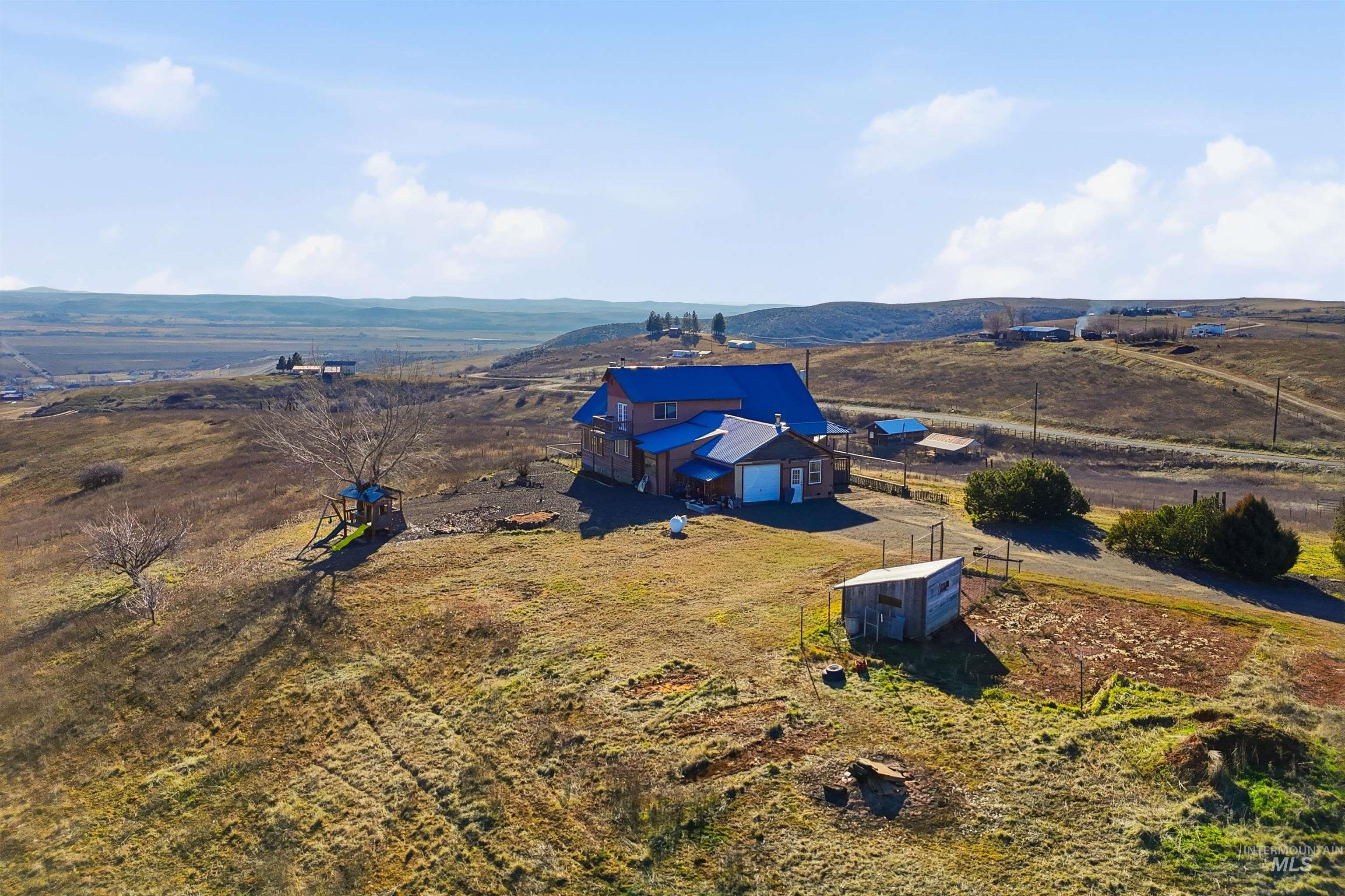 1252 Mesa Mesa, ID 83643 - Photo 46 of 50 Aerial view of sparsely populated area featuring a mountainous background