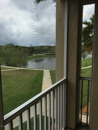 a view of lake from a balcony