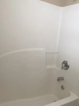 a view of a kitchen with a window