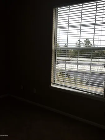 a view of a kitchen with a window