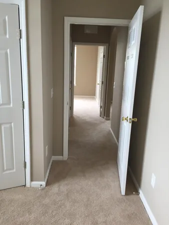 a view of a room with racks on the wall