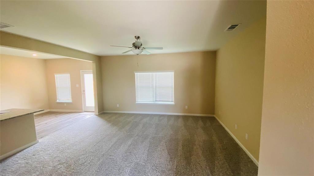 261 Moonstone Way Princeton, TX 75407 - Photo 2 of 9 a view of an empty room with a window