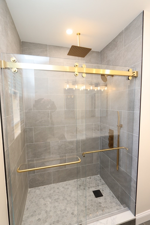 14-16 Harriet Street, Unit 1 Boston, MA 02135 - Photo 11 of 28 a bathroom with a shower