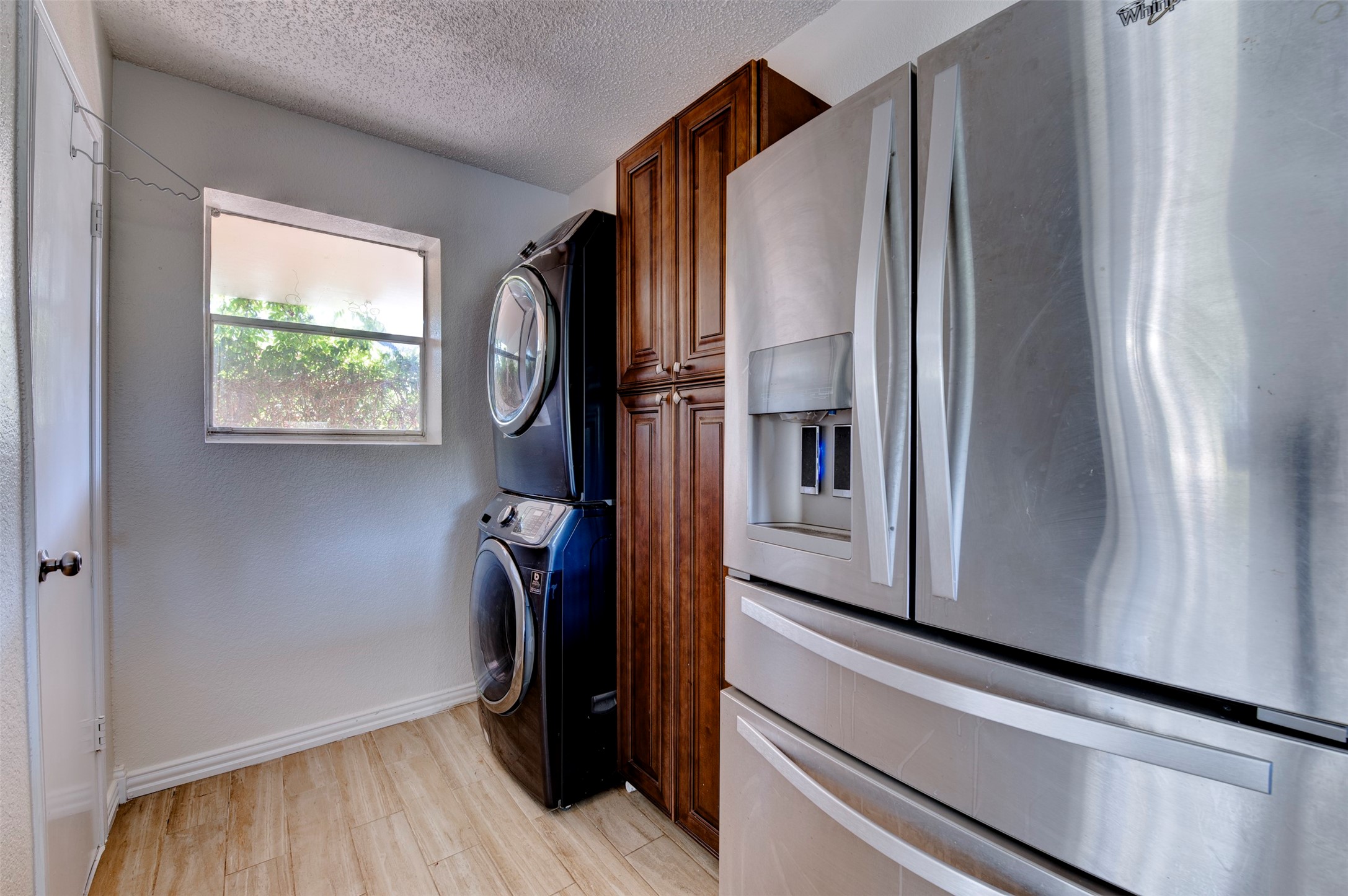 2137 Casa Rio Circle Dickinson, TX 77539 - Photo 18 of 36 All the essentials included — dishwasher, microwave, washer/dryer, and updated fridge