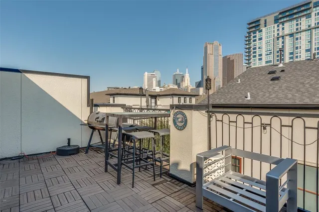 a view of a chairs and table on the terrace