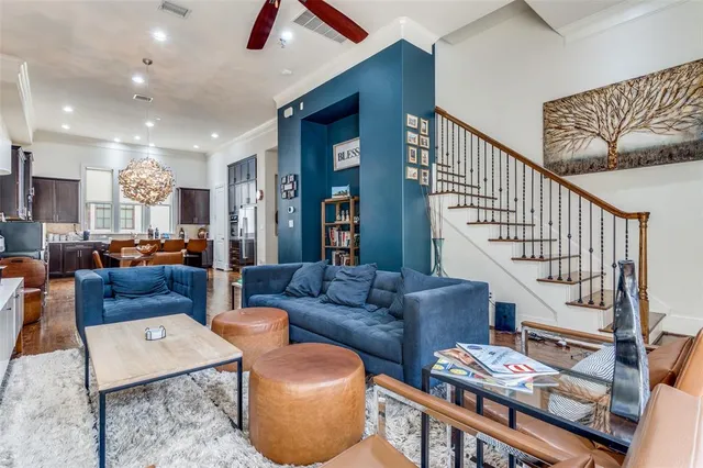 a living room with furniture or couch and a dining table