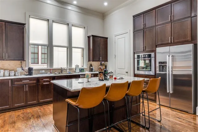 a large kitchen with lots of counter space and window