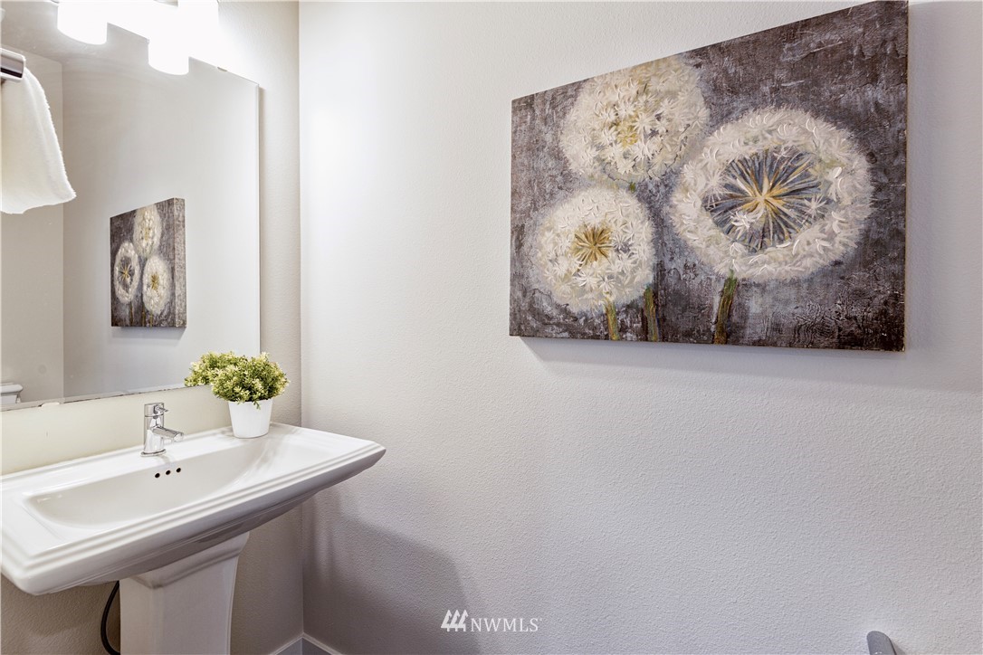 21325 43rd Drive Southeast Bothell, WA 98021 - Photo 16 of 32 a bathroom with a sink and a mirror