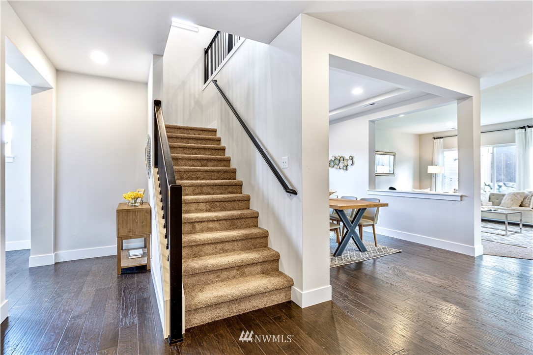 21325 43rd Drive Southeast Bothell, WA 98021 - Photo 17 of 32 a view of entryway and hall with wooden floor