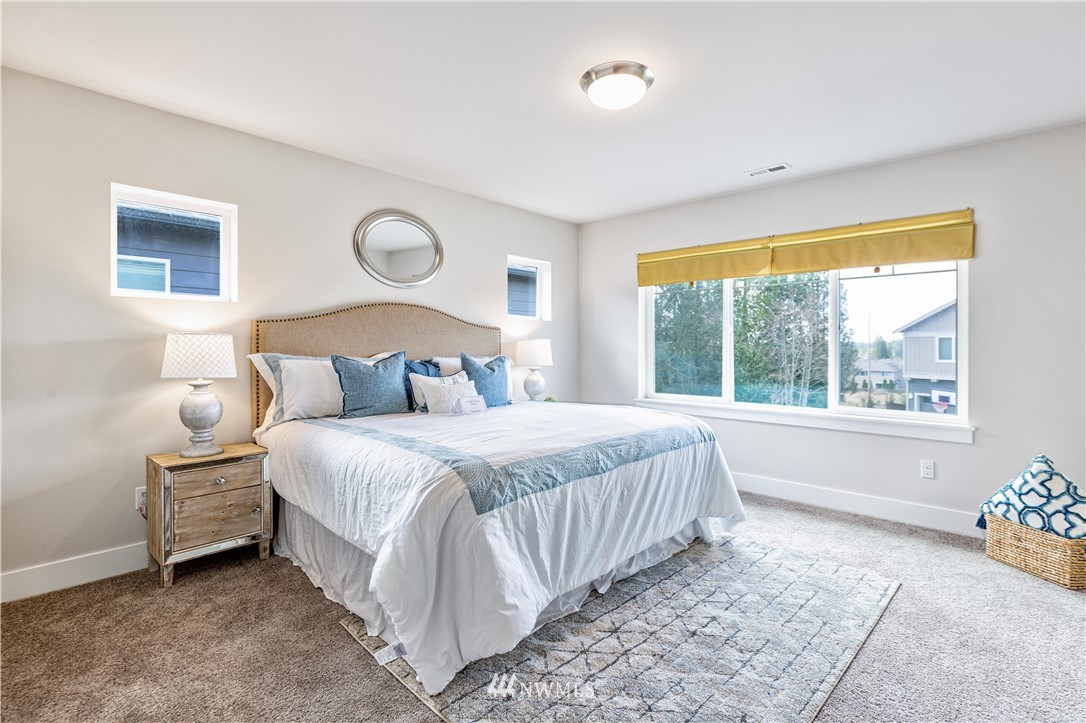 21325 43rd Drive Southeast Bothell, WA 98021 - Photo 25 of 32 a bedroom with a bed and a window