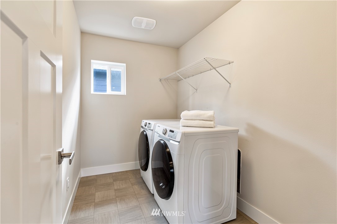 21325 43rd Drive Southeast Bothell, WA 98021 - Photo 29 of 32 a utility room with dryer and washer