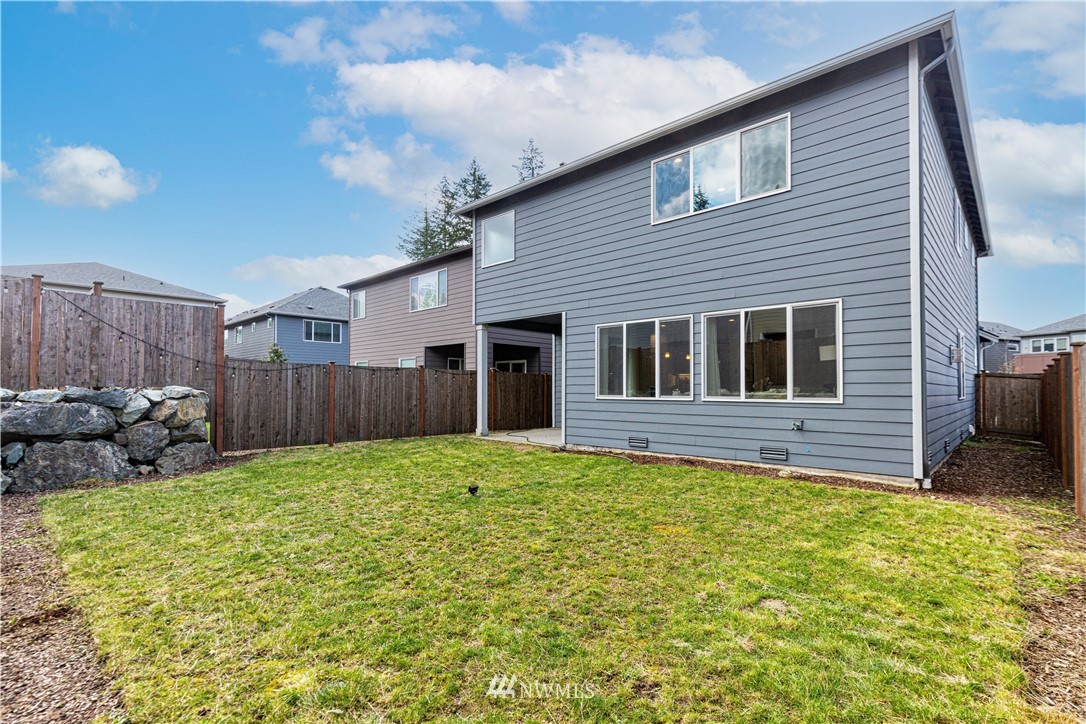 21325 43rd Drive Southeast Bothell, WA 98021 - Photo 32 of 32 a view of a house with a yard and wooden fence