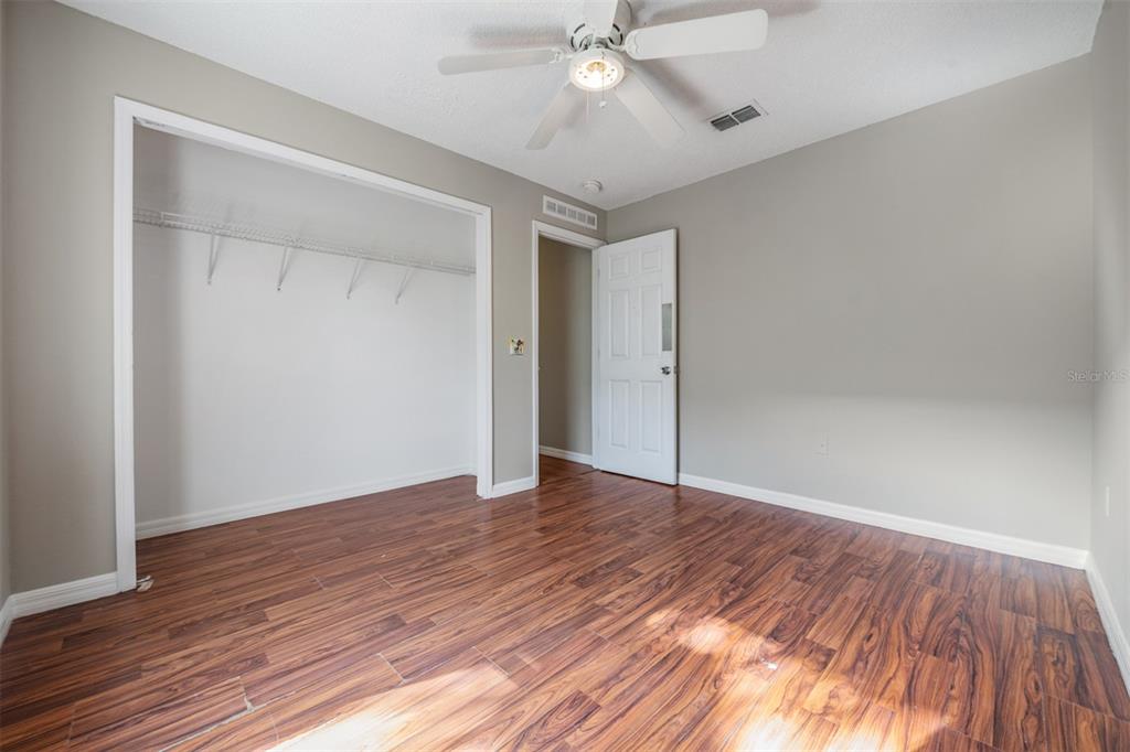 13364 Linden Drive Spring Hill, FL 34609 - Photo 19 of 28 wooden floor in an empty room