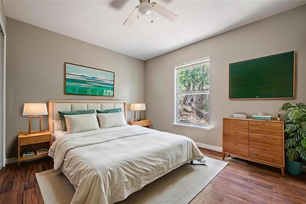 13364 Linden Drive Spring Hill, FL 34609 - Photo 21 of 28 a bedroom with a bed and a flat screen tv