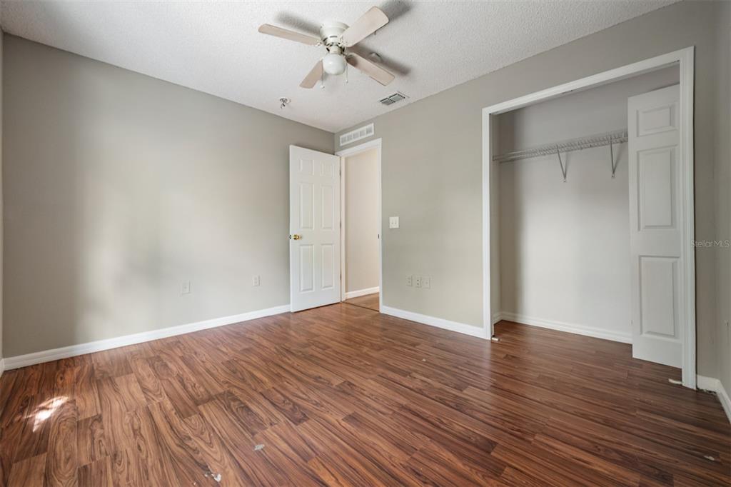 13364 Linden Drive Spring Hill, FL 34609 - Photo 22 of 28 a view of an empty room with wooden floor