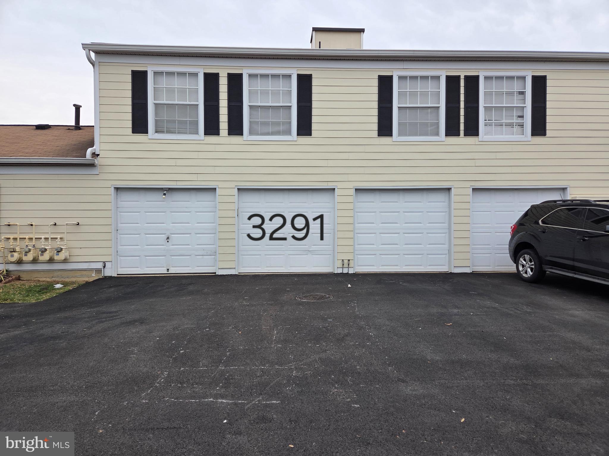 3291 Chester Grove Road Upper Marlboro, MD 20774 - Photo 32 of 38 a view of garage and car parked