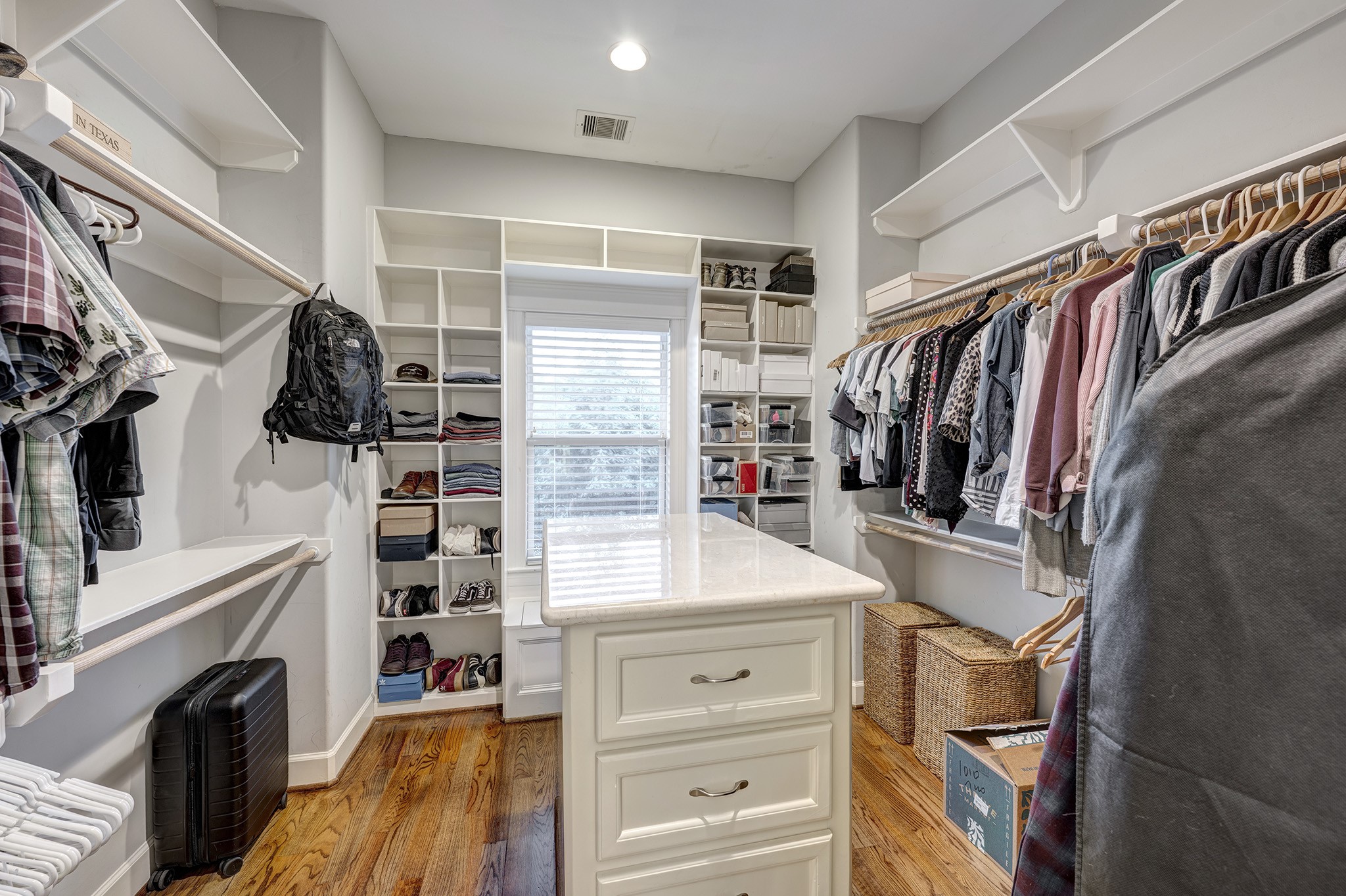 1010 Nicholson Street Houston, TX 77008 - Photo 20 of 28 a view of walk in closet with clothes and shoes