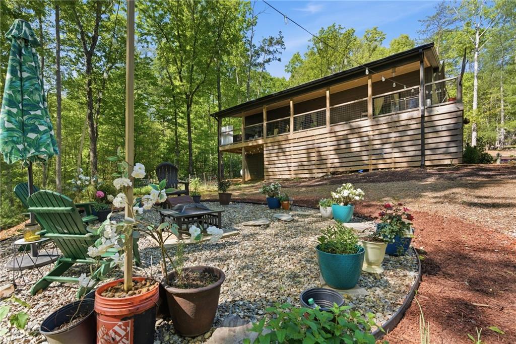 191 Oakwood Road Blairsville, GA 30512 - Photo 35 of 43 a front view of a house with sitting area