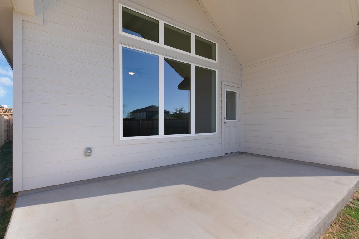 25621 Flora Bella Lane Elgin, TX 78621 - Photo 18 of 27 a view of an empty room with a window