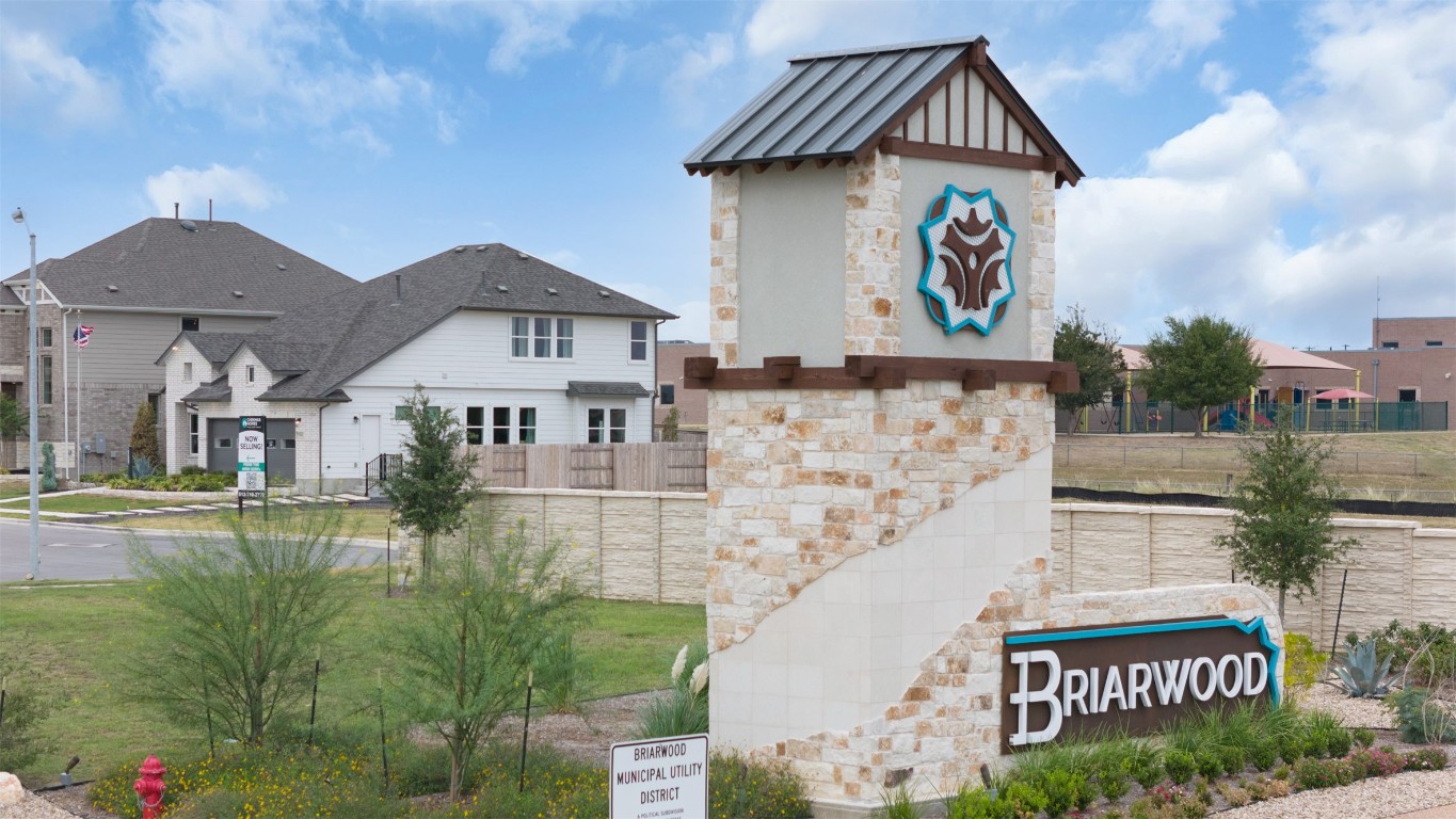 25621 Flora Bella Lane Elgin, TX 78621 - Photo 22 of 27 a front view of a house with garden