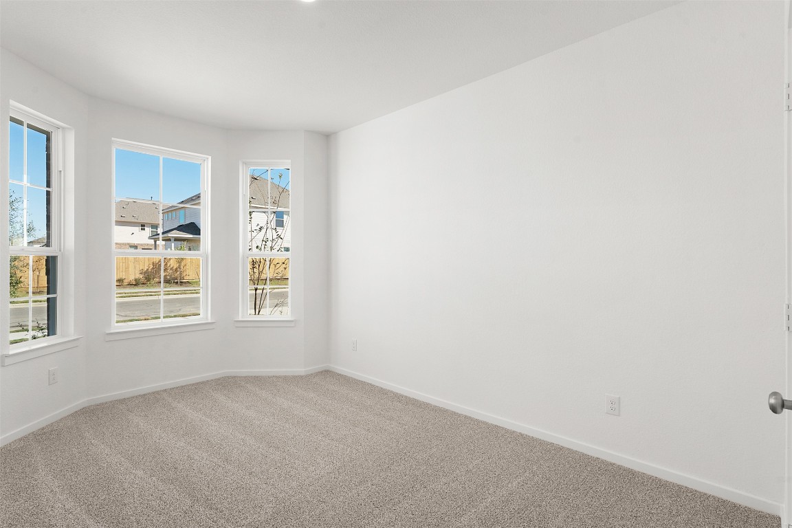 25621 Flora Bella Lane Elgin, TX 78621 - Photo 4 of 27 an empty room with a window