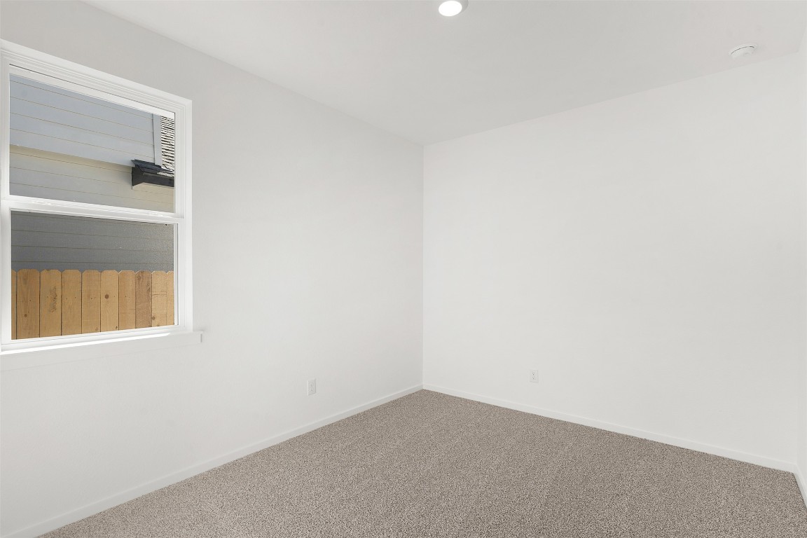 25621 Flora Bella Lane Elgin, TX 78621 - Photo 7 of 27 a view of an empty room