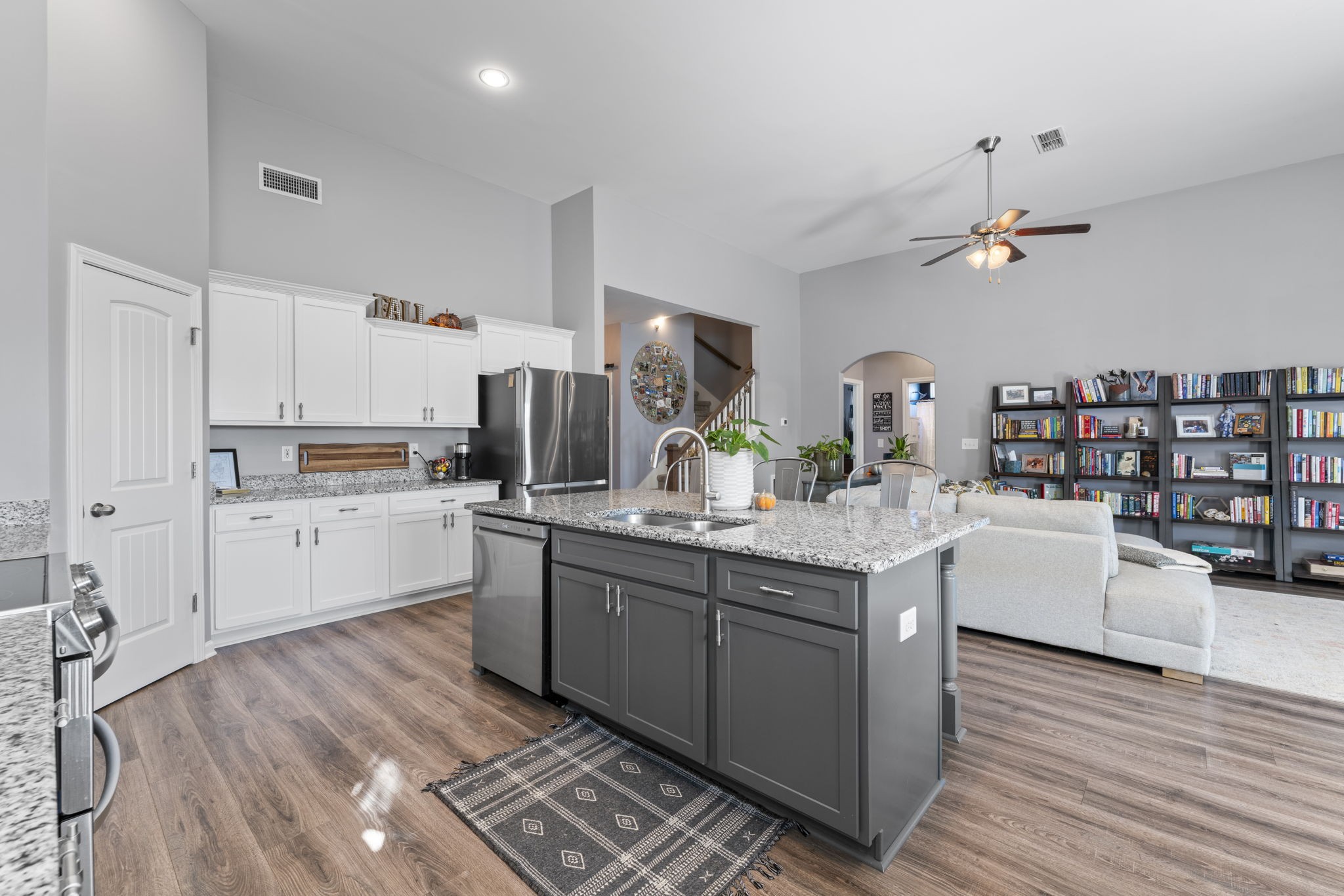 100 East Coker Way Spring Hill, TN 37174 - Photo 12 of 51 a kitchen with white cabinets and white appliances