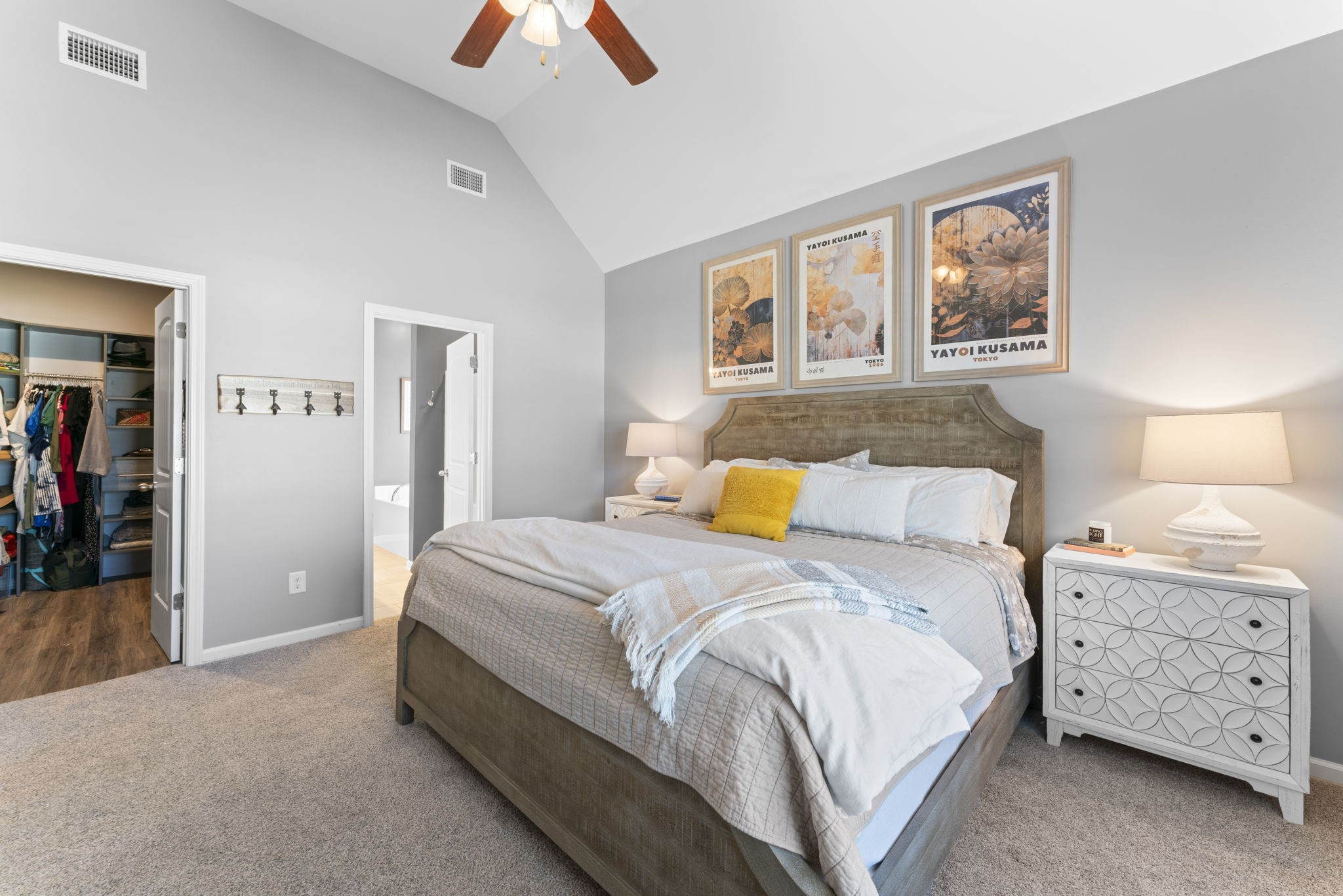 100 East Coker Way Spring Hill, TN 37174 - Photo 19 of 51 a spacious bedroom with a bed and a lamp on dresser