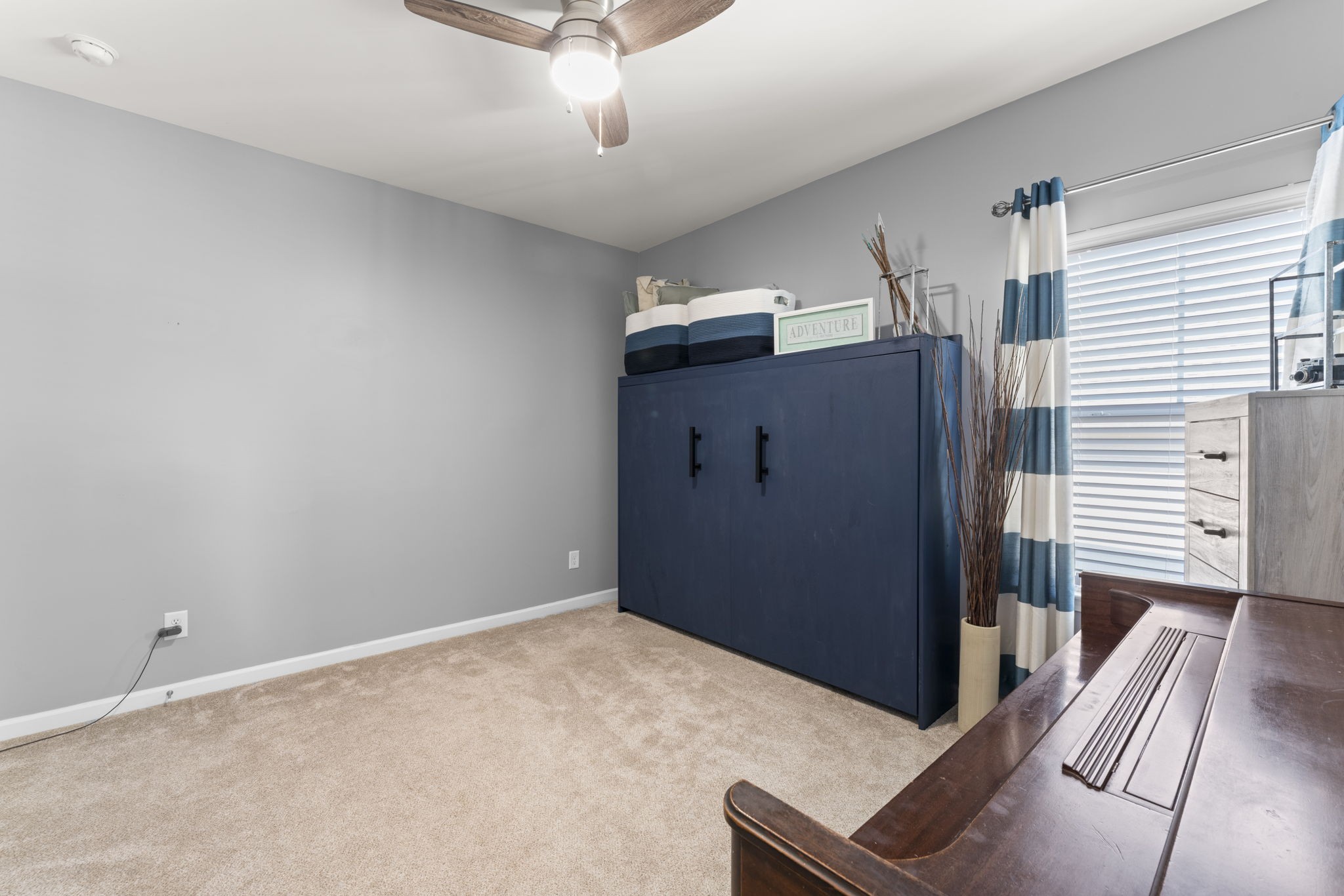 100 East Coker Way Spring Hill, TN 37174 - Photo 28 of 51 a view of a hallway with wooden floor and staircase