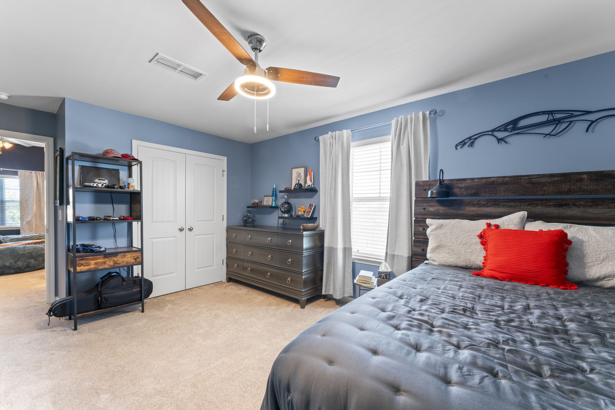 100 East Coker Way Spring Hill, TN 37174 - Photo 31 of 51 a bedroom with a bed and furniture