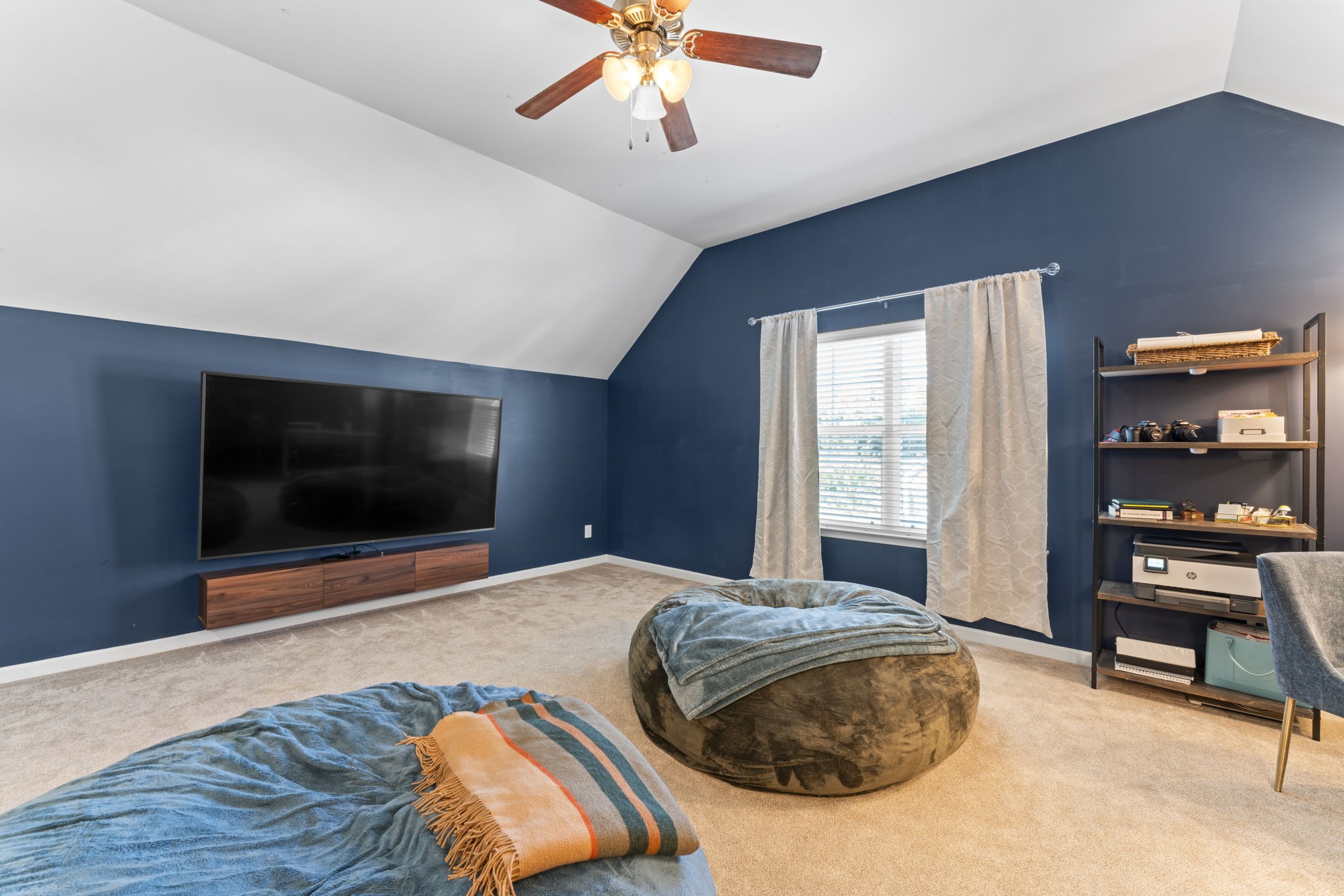 100 East Coker Way Spring Hill, TN 37174 - Photo 33 of 51 a bedroom with a bed and a flat screen tv