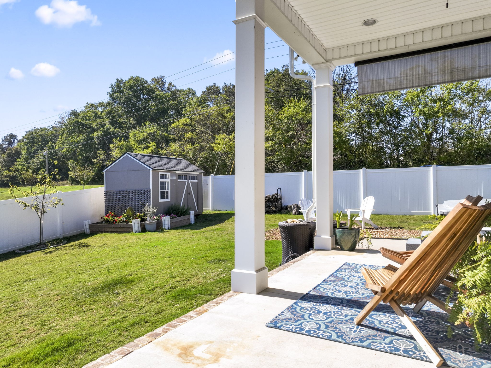 100 East Coker Way Spring Hill, TN 37174 - Photo 37 of 51 a view of a house with backyard and sitting area