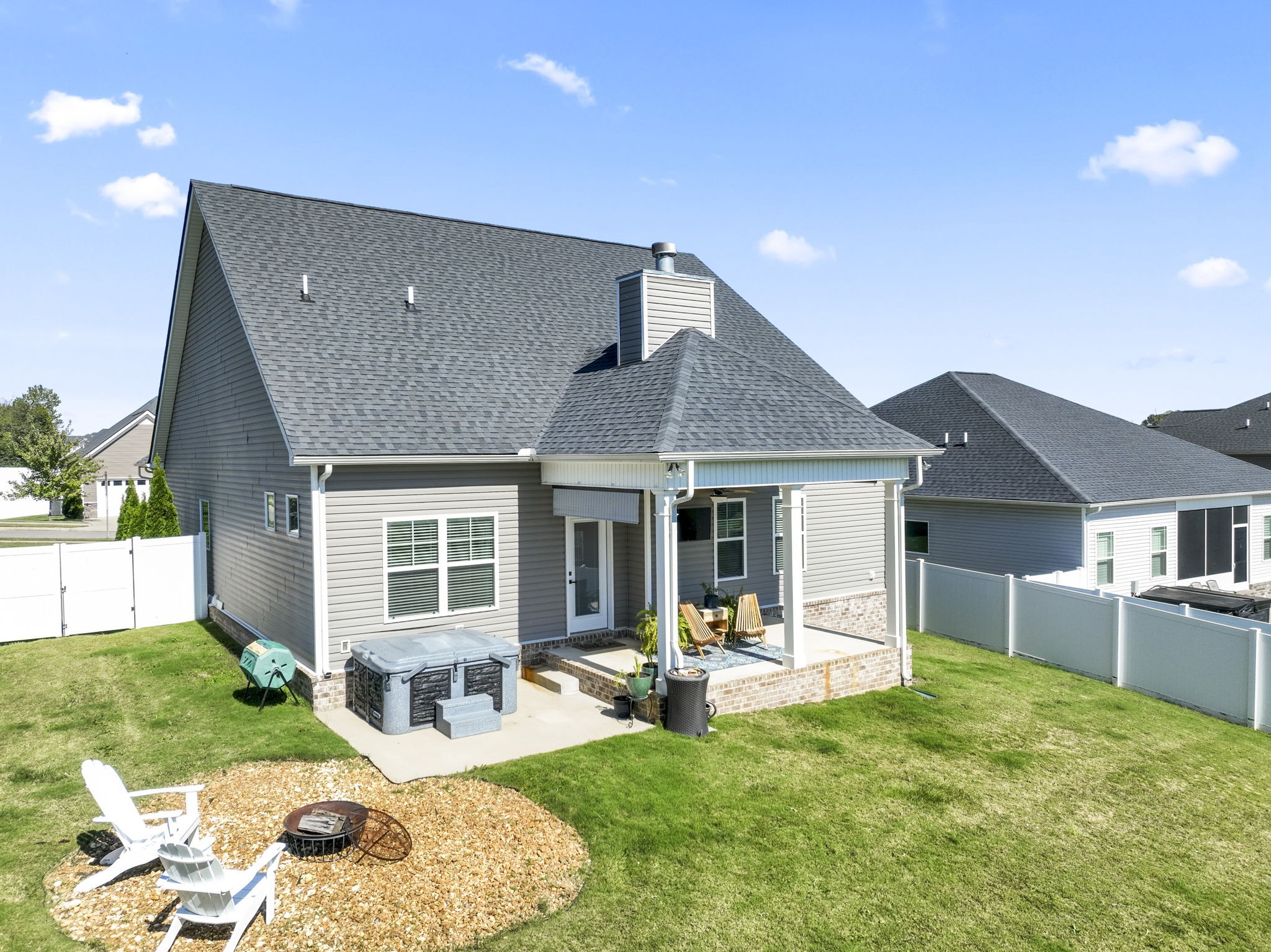 100 East Coker Way Spring Hill, TN 37174 - Photo 39 of 51 a front view of a house with garden and patio