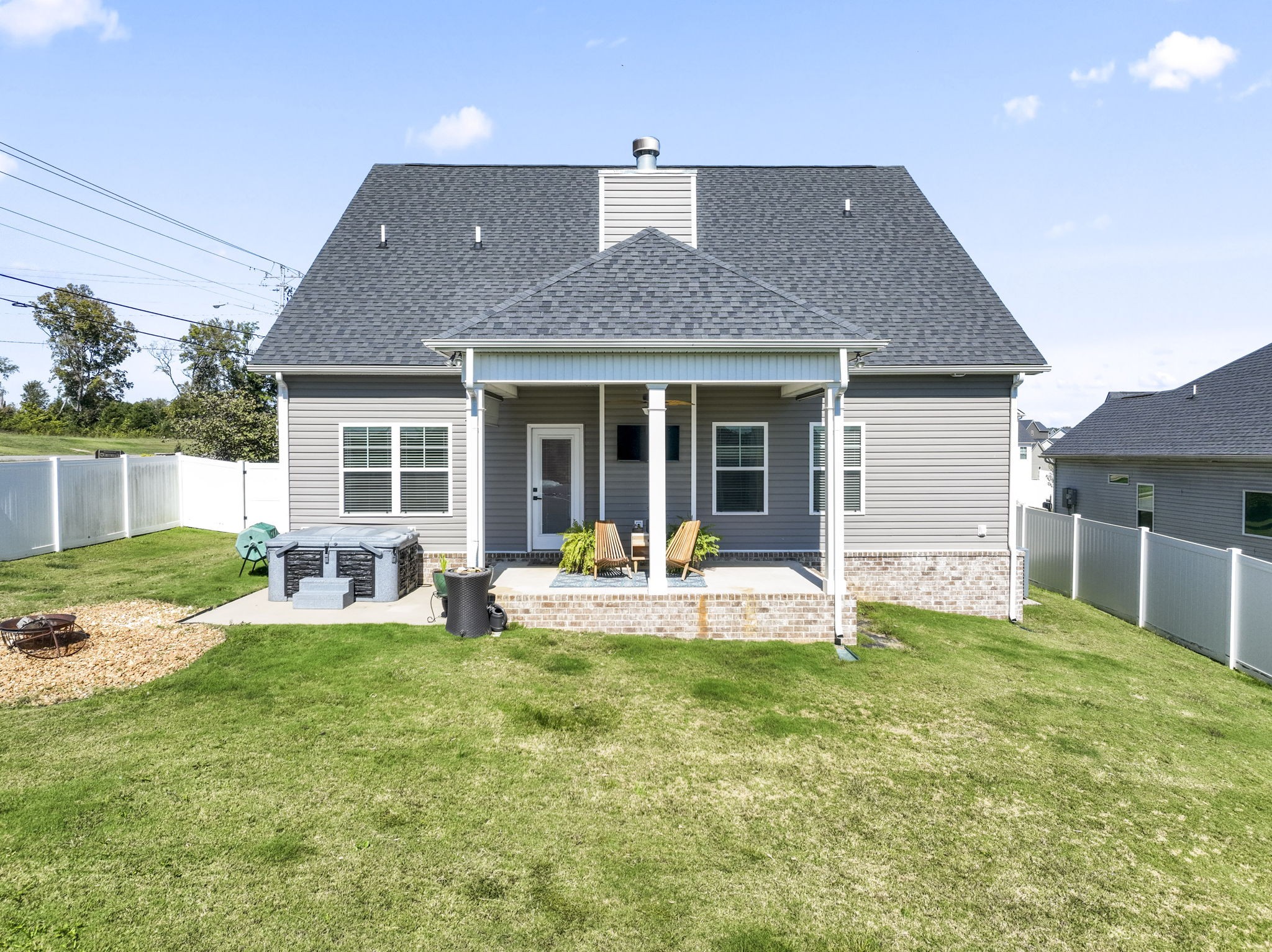 100 East Coker Way Spring Hill, TN 37174 - Photo 40 of 51 a house view with a sitting space and garden