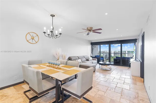 a very nice looking dining room with a table and chairs