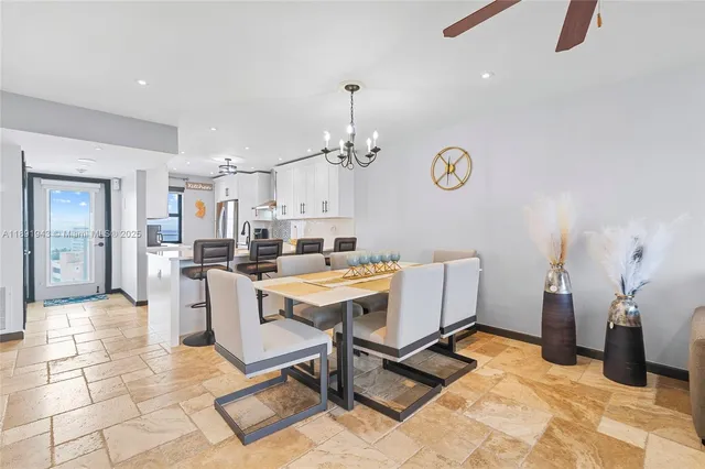 a view of a dining room with furniture