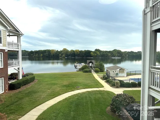 a view of a lake with a garden and lake view
