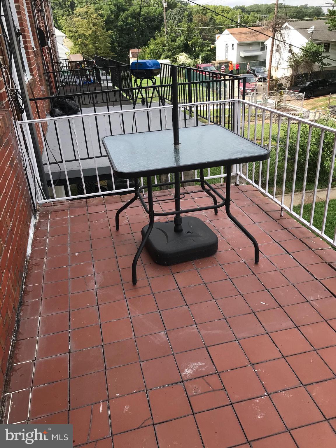 1131 Wedgewood Road Baltimore, MD 21229 - Photo 11 of 79 Brick tile balcony off of Kitchen